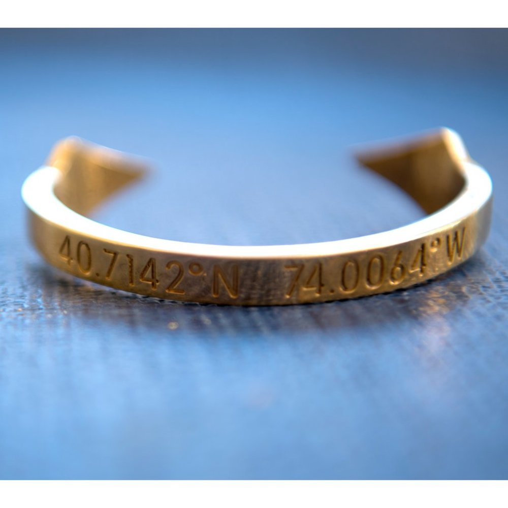 Intermix Gold-Toned Brass Bracelet with Coordinates of NYC